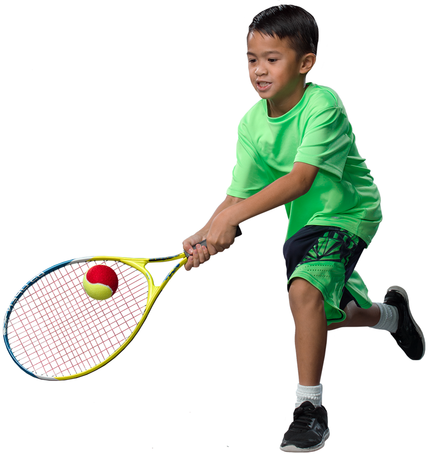 Young boy Hitting ball Young boy hitting a red tennis ball with a backhand technique.