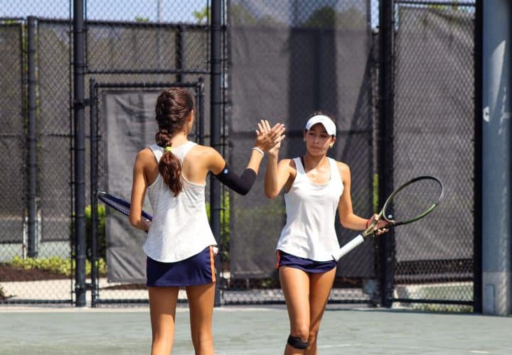 Two players high fiving