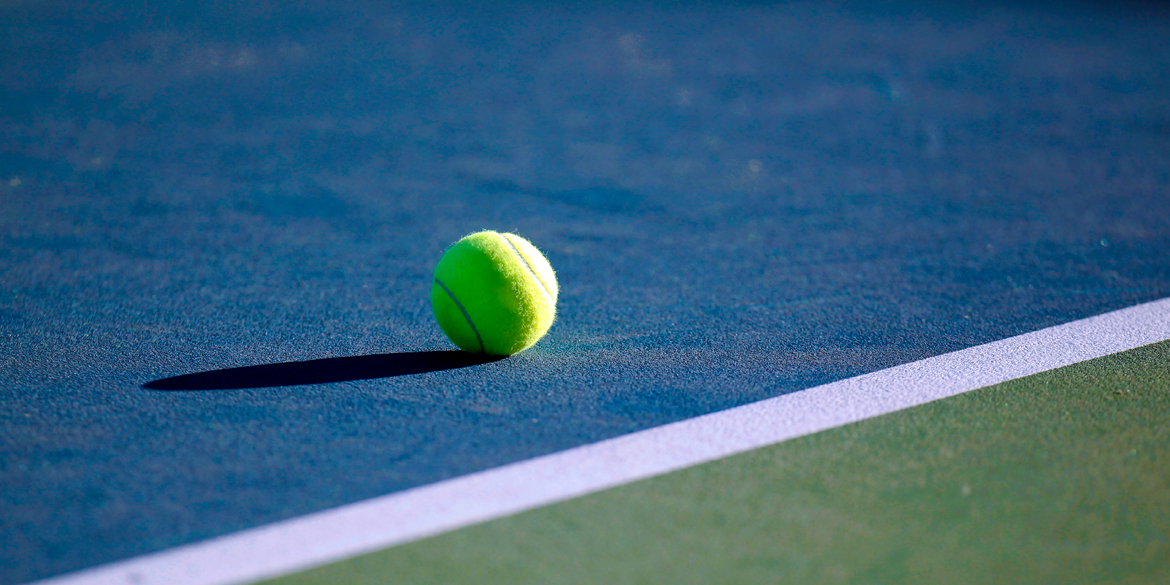 Tennis ball on court