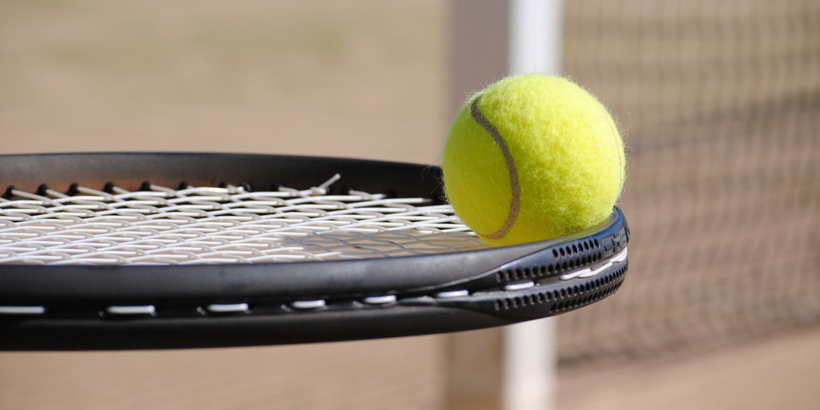 Tennis ball and racquet