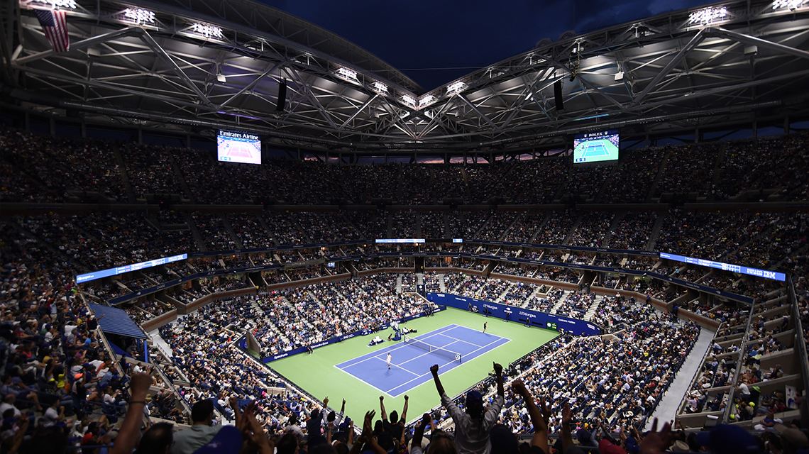 Arthur Ashe Stadium at night during the US Open, illustrating the new final-set tiebreak format introduced at Grand Slam matches.